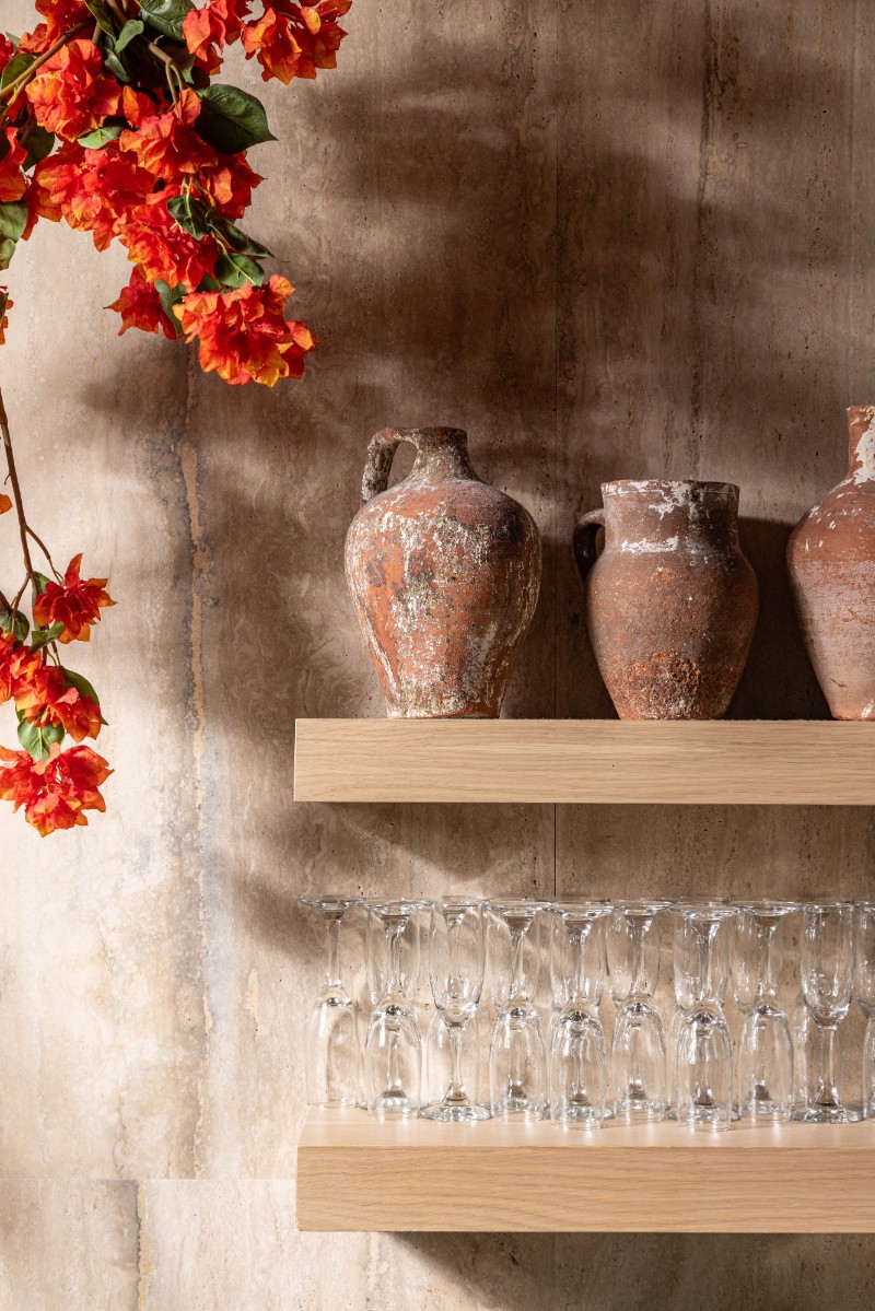 wooden shelving with ceramic pots